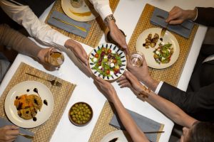 top-view-friends-having-lunch-luxury-restaurant